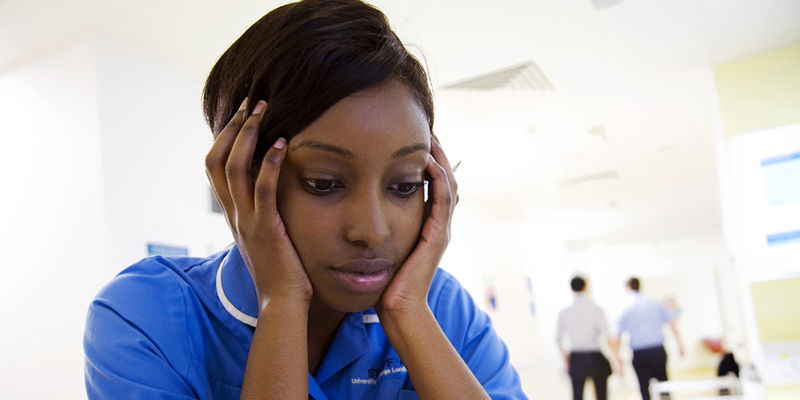 stressed uk nurse